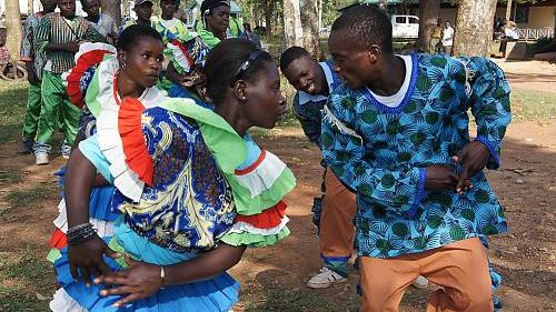 Women of the Idakho community perform Isukuti dance in Kakamega, western Kenya, using cultural performance to advocate for land rights